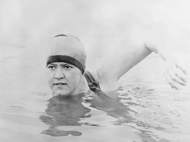 An old overexposed photo of Gertrude Ederle pictured swimming in the English Channel.