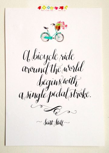 A bicycle ride around the world begins with a single pedal stroke quote calligraphy